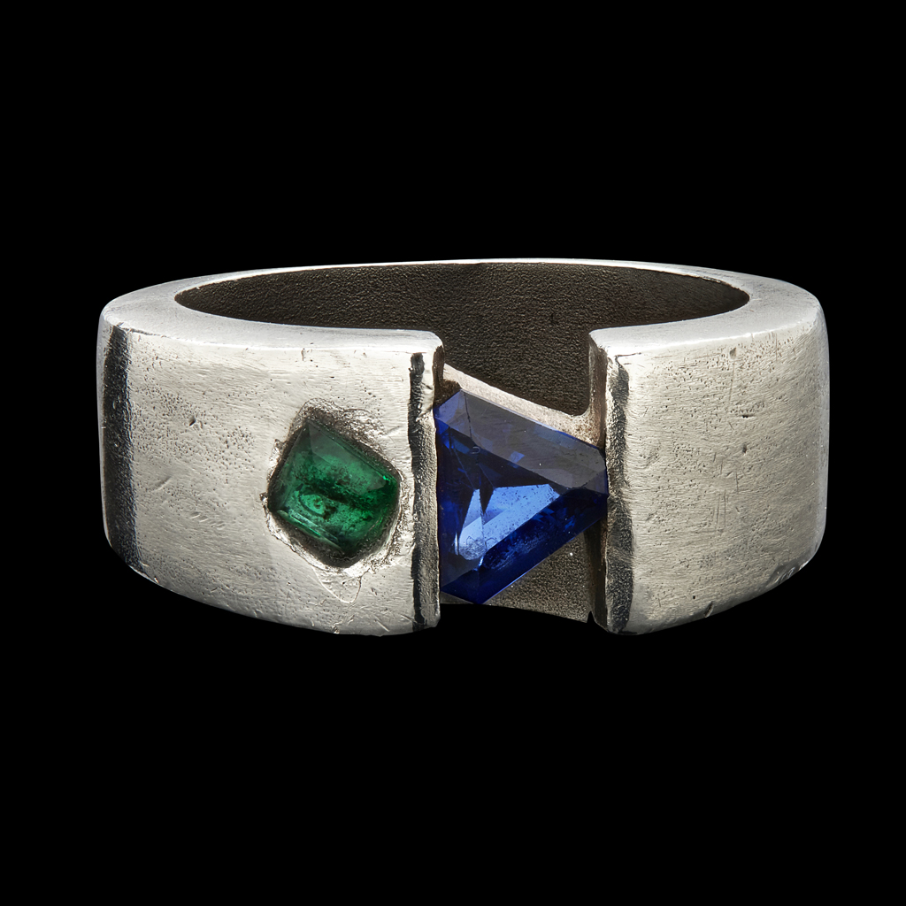 Appraisal: A contemporary sapphire and diamond set ringopen set with a