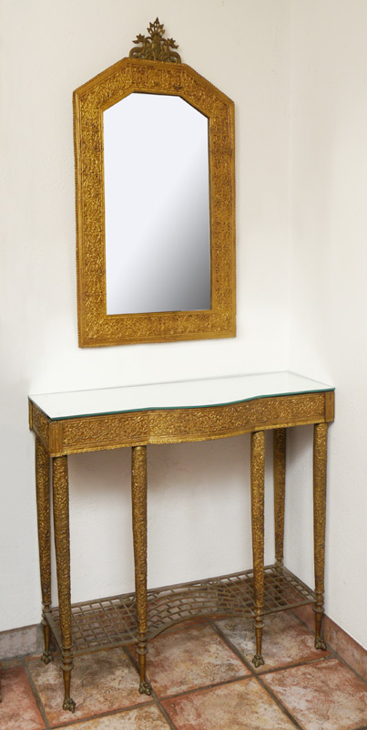 Appraisal: EDGAR BRANDT STYLE FOYER TABLE MIRROR Table with shaped mirror