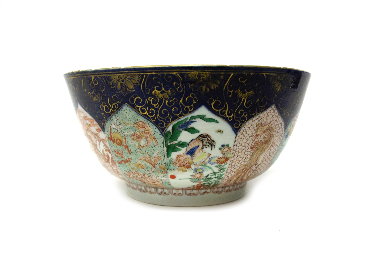 Appraisal: A Chinese famille-verte punchbowl Kangxi enamelled on the exterior with