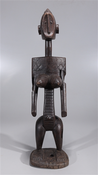 Appraisal: Carved wood African Dogon fertility figure with intricate designs crafted