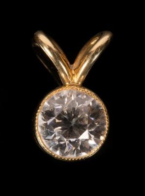 Appraisal: A round cut diamond mounted as a pendant in ct