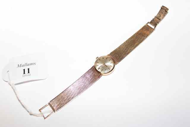 Appraisal: A CT GOLD LADIES OMEGA WRIST WATCH the silvered face