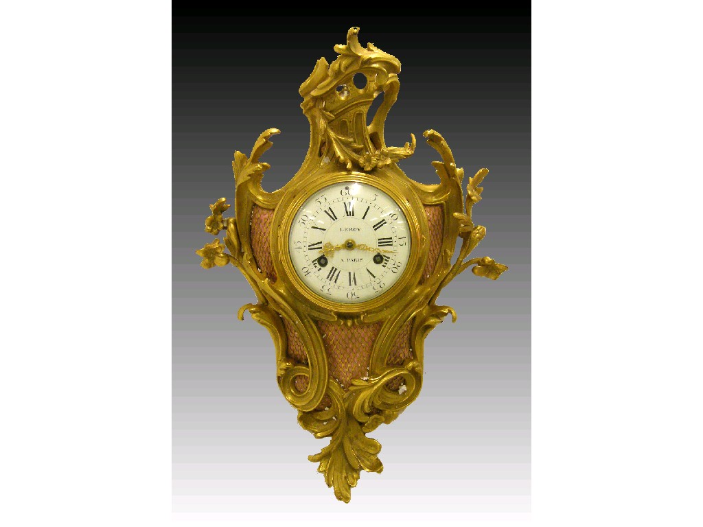 Appraisal: Good French ormolu two train Cartel wall clock the large