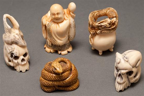 Appraisal: Five Japanese carved ivory netsukes falcon perched on skull mouse