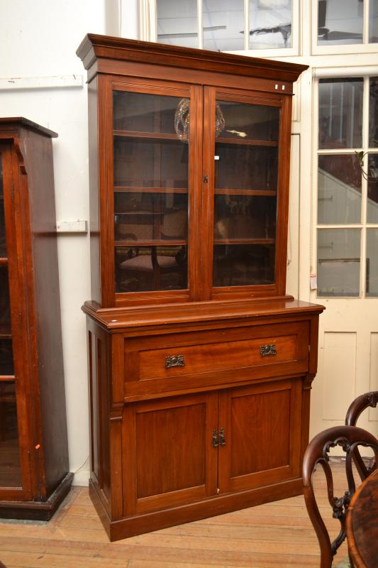 Appraisal: AN EDWARDIAN WALNUT BOOKCASE SECRETAIRE AN EDWARDIAN WALNUT BOOKCASE SECRETAIRE