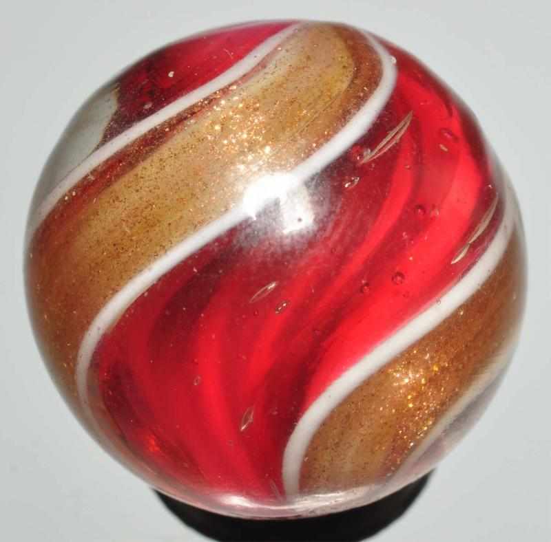 Appraisal: Cranberry Ribbon Lutz Swirl Marble Description Two nice broad bands