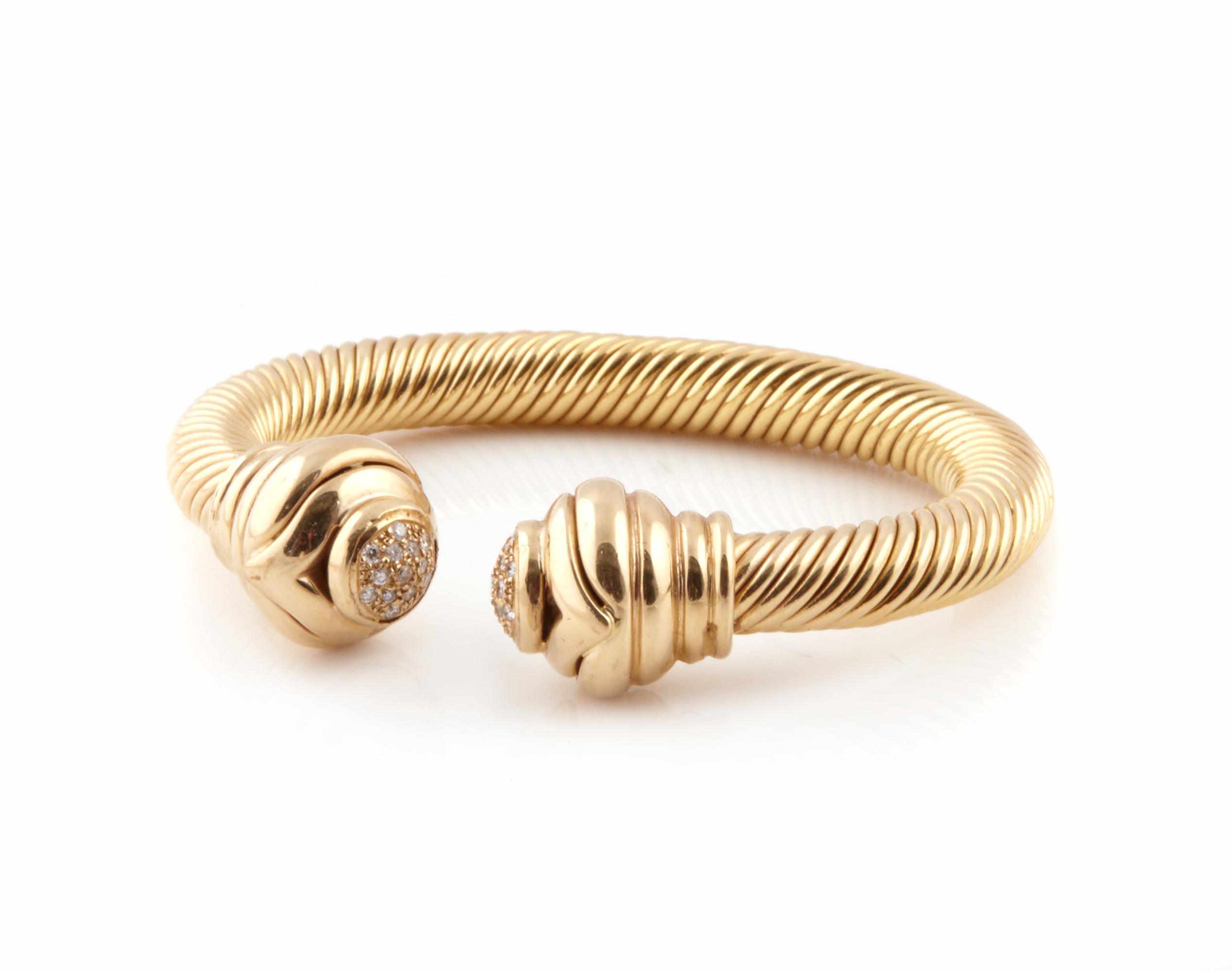 Appraisal: A diamond and k gold coil bangle diameter in g