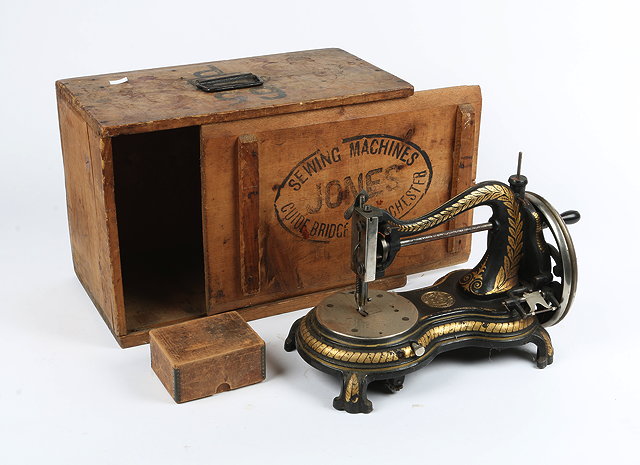 Appraisal: AN ANTIQUE JONES SEWING MACHINE in original box