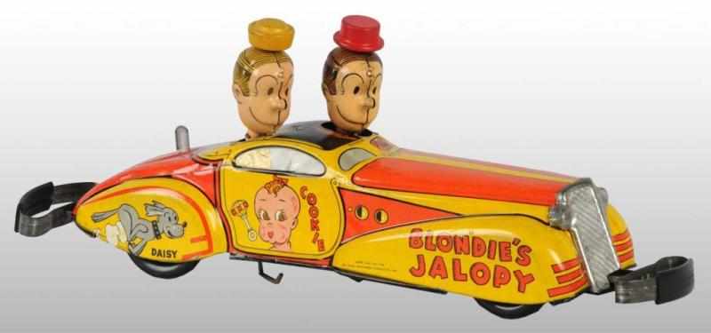 Appraisal: Tin Marx Blondie's Jalopy Wind-Up Car Toy Description American Working