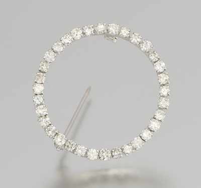 Appraisal: A White Gold and Diamond Circle Brooch White gold circle