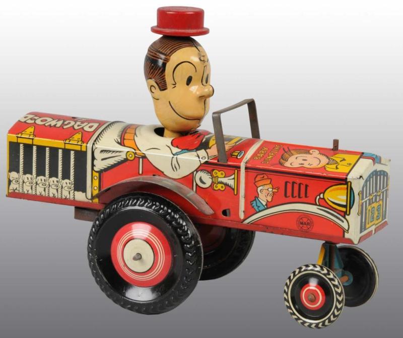 Appraisal: Marx Dagwood the Driver Wind-Up Toy Description Tin litho Made