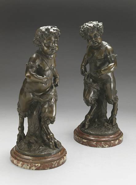 Appraisal: A pair of patinated bronze figures in the manner of