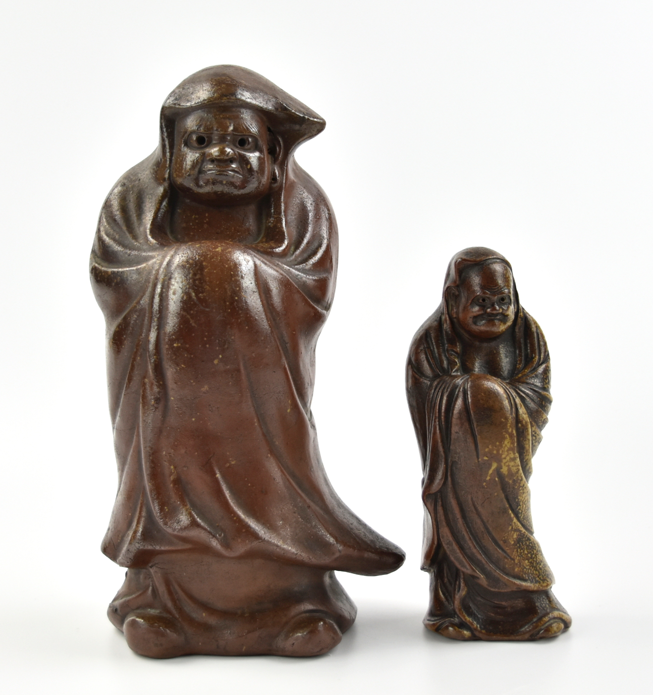 Appraisal: Japanese Zisha figure covered overall in long robes with thick