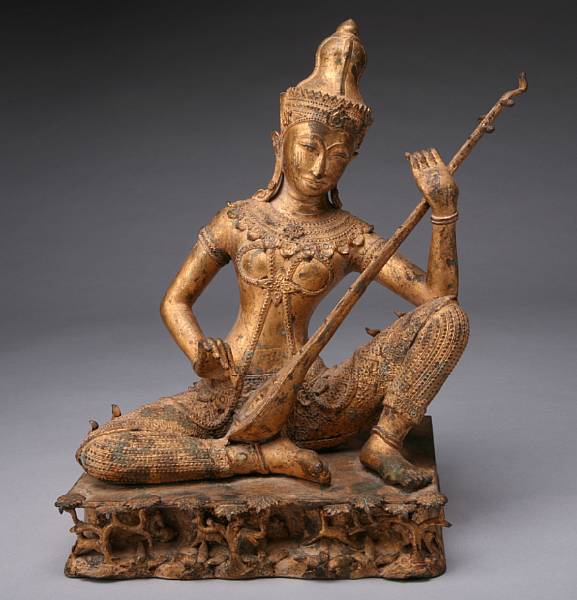 Appraisal: A Southeast Asian gilt metal musician height in width in