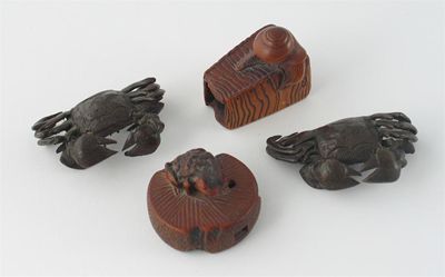 Appraisal: Two Japanese hardwood carvings one of a toad upon a