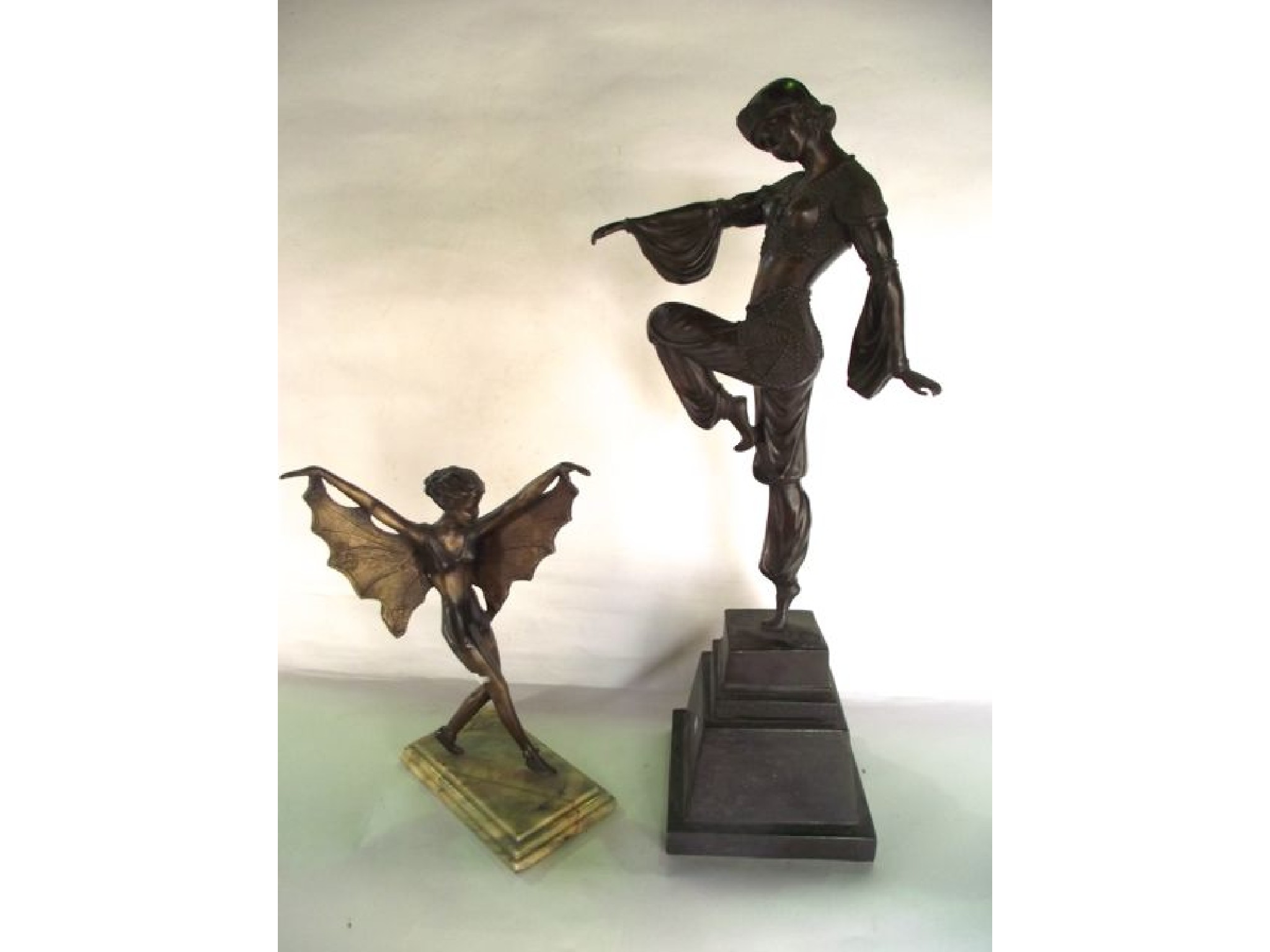 Appraisal: A cast bronze study of a female balanced on right