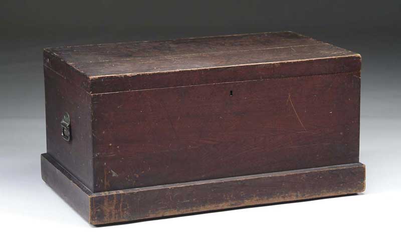 Appraisal: WALNUT STORAGE TRUNK th Century With original lock present no