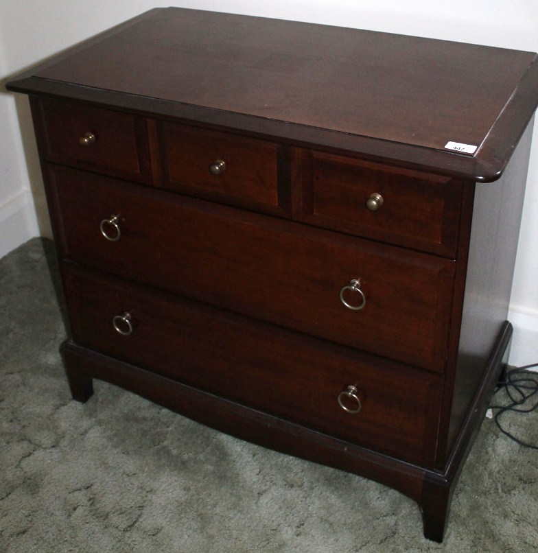 Appraisal: A Stag mahogany chest of three short and two long