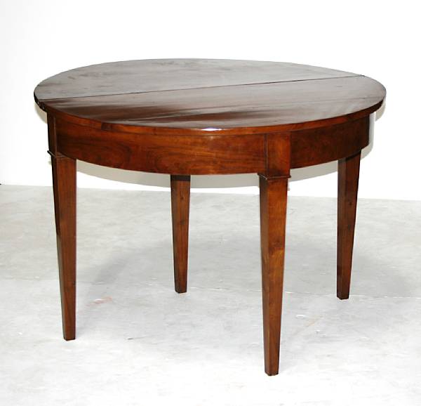 Appraisal: A Directoire style walnut demilune folding table height in width