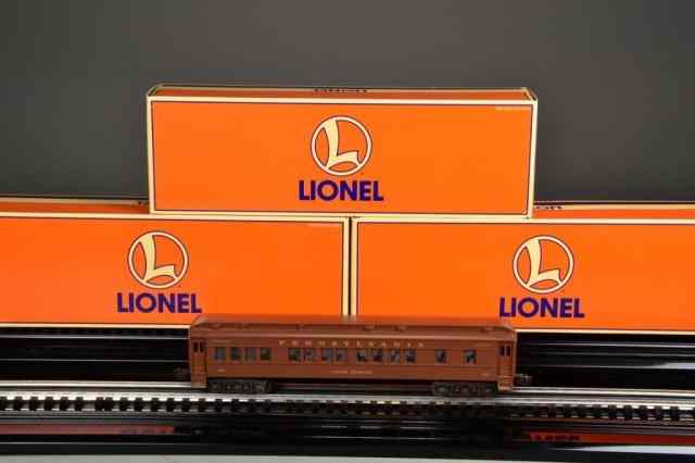 Appraisal: LIONEL PASSENGER OBSERVATION CARSMadison baggage car - two passenger cars