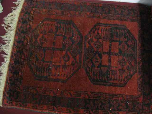 Appraisal: Beluchi Handmade Mat indigo geometrics on red field ' ''