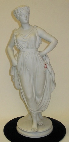 Appraisal: GERMAN BISQUE FIGURE depicting a young woman in classical flowing