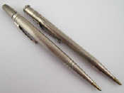 Appraisal: A silver 'Yard-O-Led' propelling pencil hallmarked London and a propelling