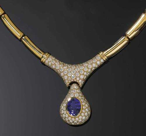 Appraisal: TANZANITE BRILLIANT-CUT DIAMOND AND GOLD NECKLACE Yellow gold Attractive casual-elegant