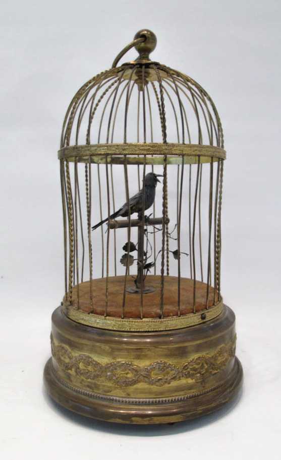 Appraisal: FRENCH AUTOMATON SINGING BIRD IN BRASS CAGE Spring wound under