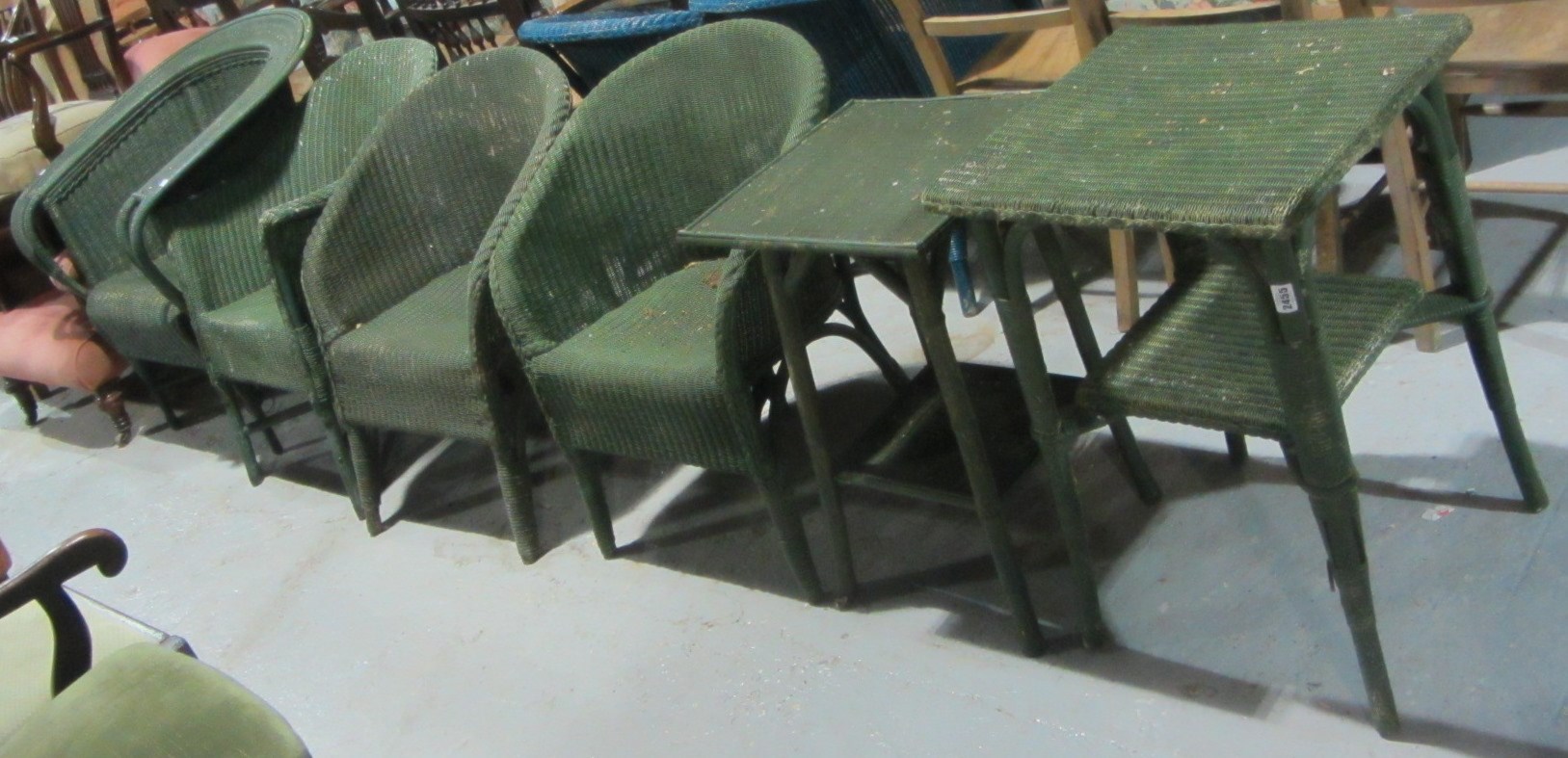 Appraisal: A group of green cane conservatory furniture including four chairs