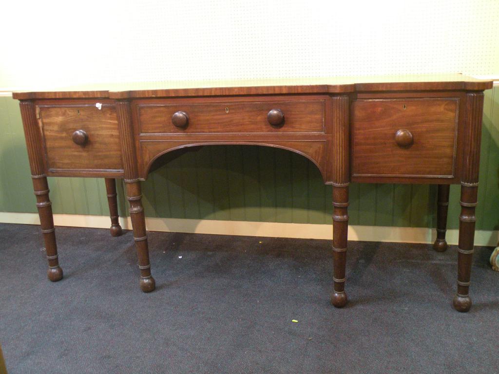 Appraisal: A George IV mahogany sideboard of inverted breakfront form with