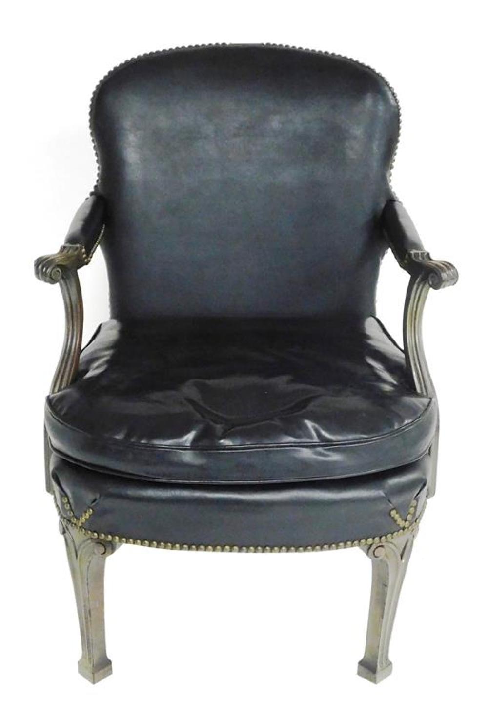 Appraisal: English style library chair black Naugahyde upholstery to shaped back