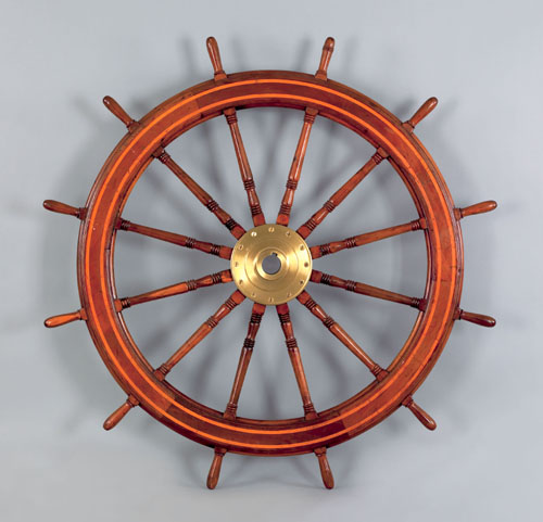 Appraisal: Mahogany ship's wheel th c with satinwood banding dia