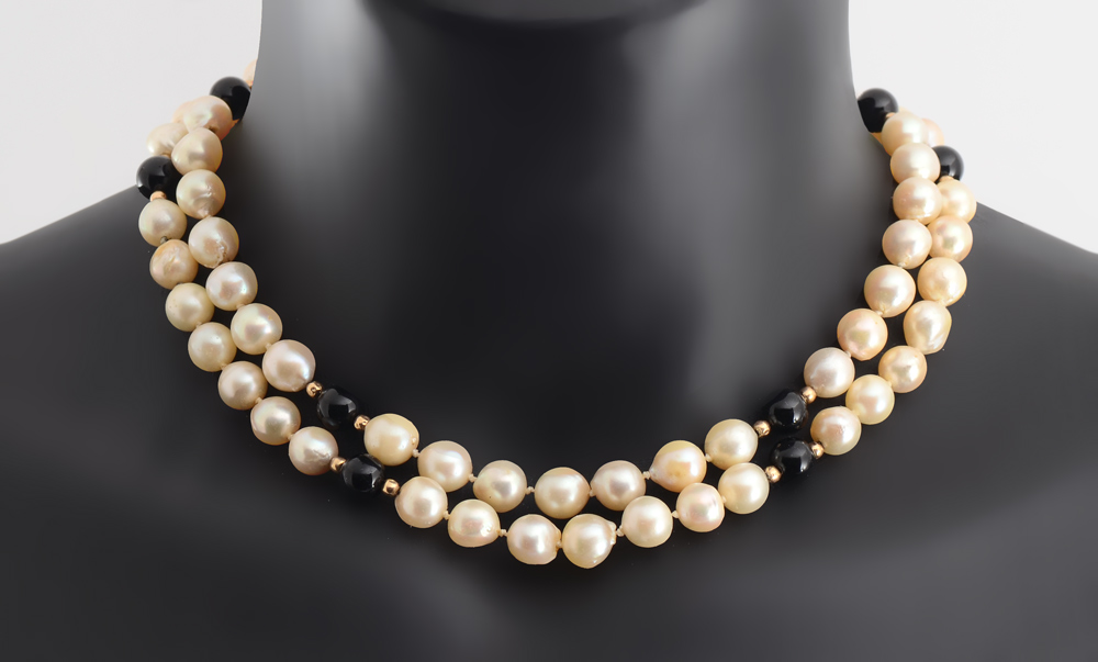 Appraisal: PEARL AND ONYX STRAND NECKLACE WITH K GOLD SPACERS ''