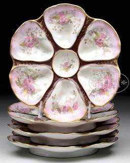 Appraisal: FOUR LIMOGES OYSTER PLATES First quarter th century marked L