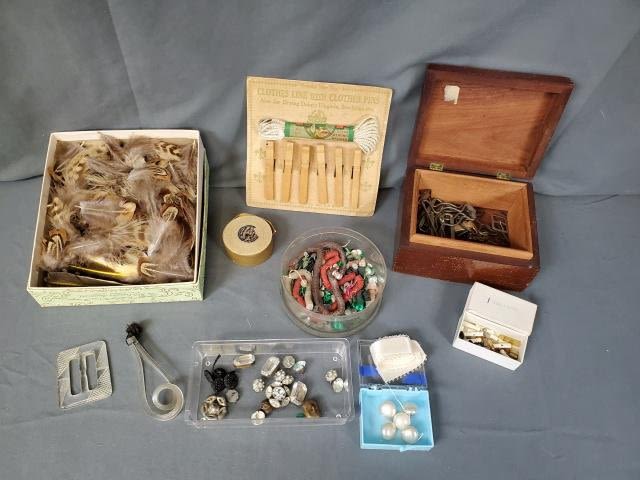 Appraisal: Includes a small box of pretty feathers a small container