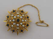 Appraisal: A carat gold seed pearl and sapphire star brooch hallmarked