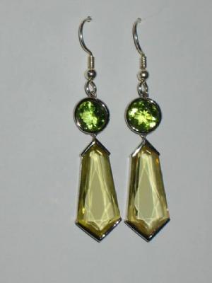 Appraisal: A PAIR OF CITRINE DROP EARRINGS the tapering faceted pendant