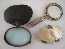 Appraisal: Two early th century traveling magnifying glasses both AF together