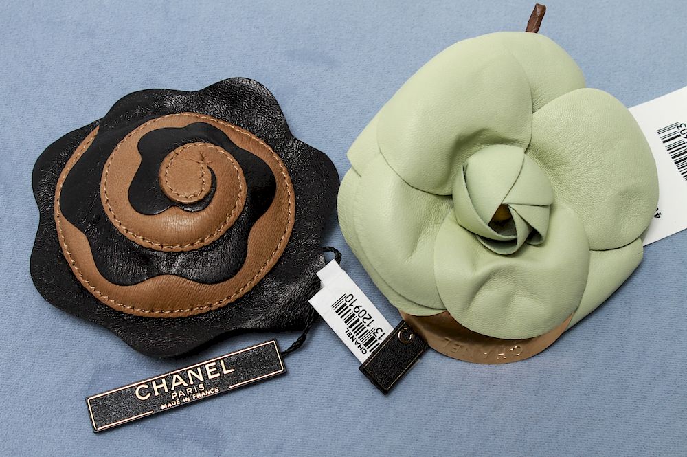 Appraisal: Chanel Vintage Leather Camellia Flower Brooches Two Chanel vintage leather