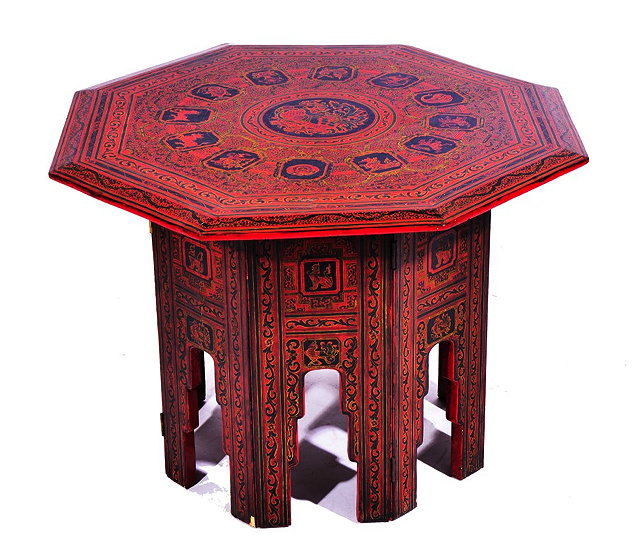 Appraisal: A BURMESE RED LACQUERED OCCASIONAL TABLE decorated the Signs of