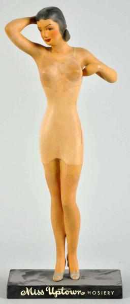 Appraisal: Hard Rubber Miss Uptown Hosiery Statue Description s All original