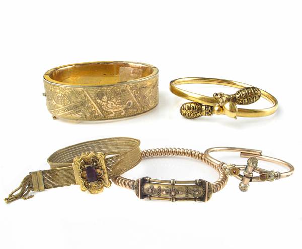 Appraisal: A collection of seven gold filled Victorian bangles