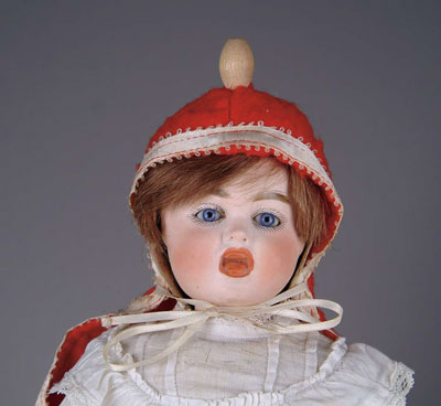 Appraisal: TWO-FACED BISQUE DOLL Probably manufactured by Carl Bergner this two-faced