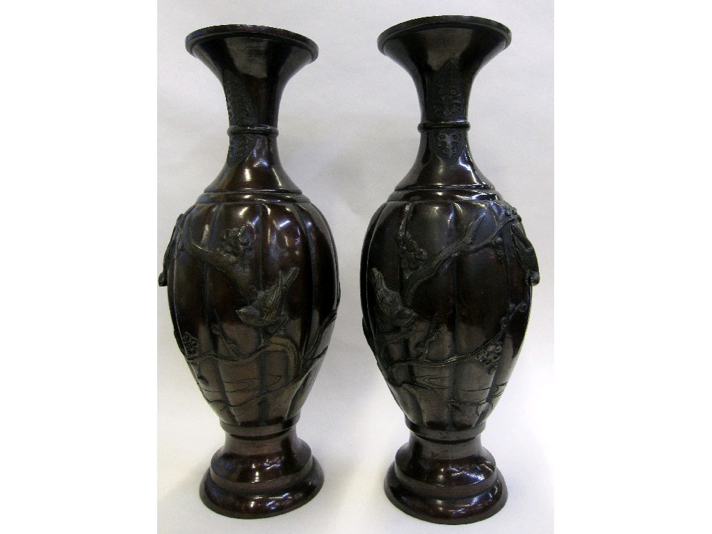 Appraisal: Pair of oriental bronzed metal vases decorated with birds and