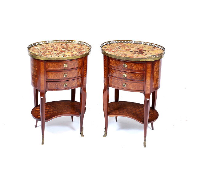 Appraisal: A PAIR OF FRENCH OVAL GUERIDONS with marble inset tops