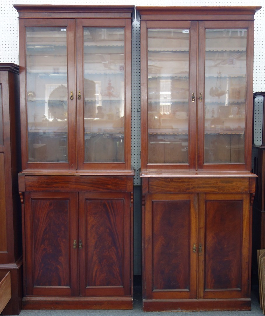 Appraisal: A pair of th century mahogany bookcases each with a