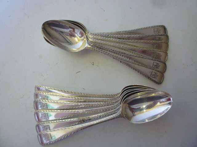 Appraisal: A SET OF TWELVE TEASPOONS maker's Barraclough Barraclough London with