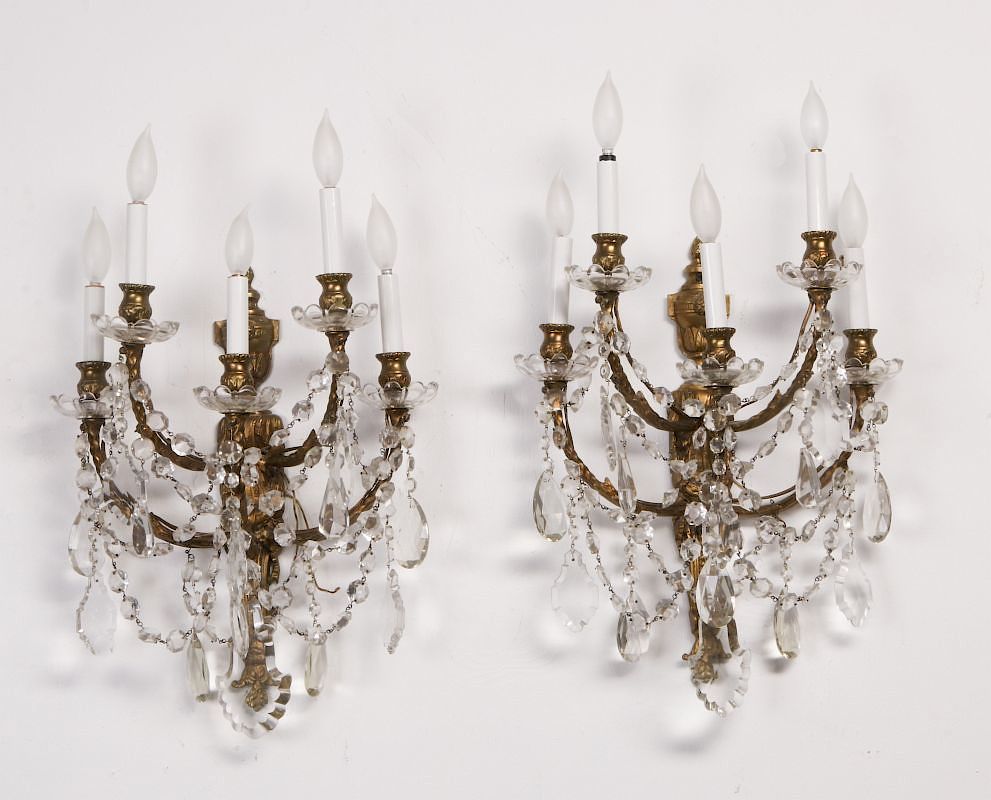 Appraisal: A PAIR FRENCH FOUR-ARM SCONCES DRESSED IN PRISMS A pair