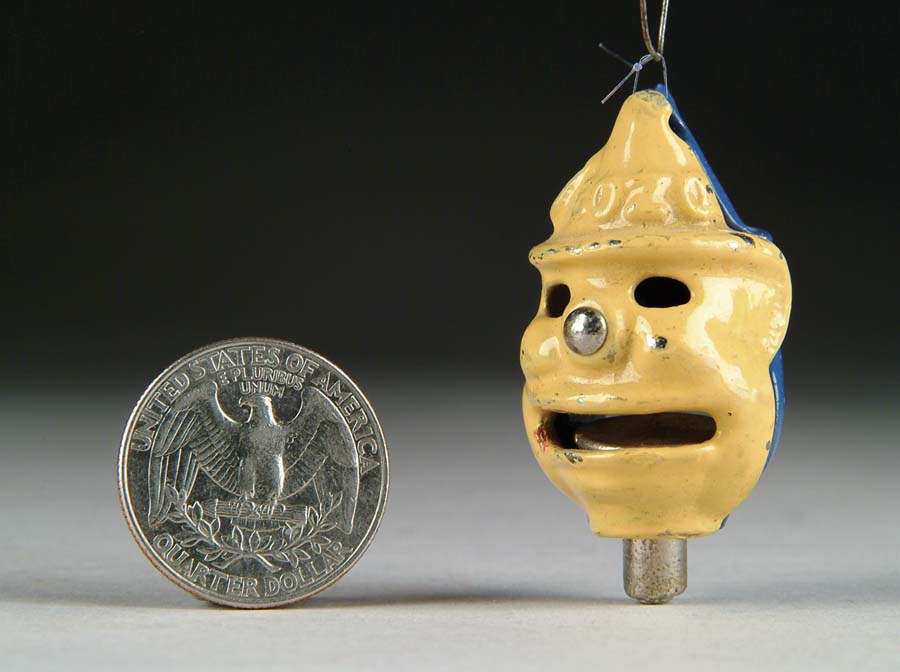 Appraisal: BOZO BLUE TOY CAP BOMB BOMB Manufacturer unknown Circa Enameled